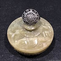 Top view showing circular filigree face of the sterling silver ring
