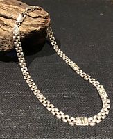 Full view of sterling heavy-link necklace with elephant motifs