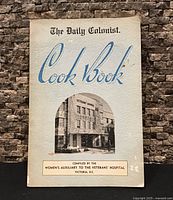 Front cover of cookbook showing title, photo of Veterans' Hospital, compiler credit