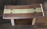 Top view showing inlaid wood seat with plugged mortises