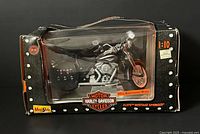 Front view of boxed Maisto Harley-Davidson die-cast motorcycle