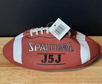 Side view showing Spalding logo and J5J model