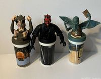 Front view of all three Star Wars Episode I Pepsi cups with toppers: Sebulba, Darth Maul, Watto