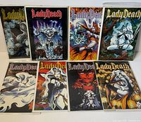 Front view showing all eight Lady Death comics in bags