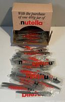 Box with wrapped Nutella spreaders visible