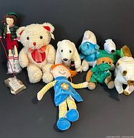 Group shot of all eight toys arranged against dark background
