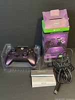 Controller, box, cable, manuals overall view