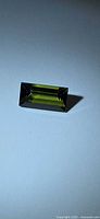 Front view of rectangular green baguette-cut tourmaline