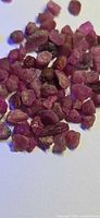 Pile of small rough ruby crystals showing natural color