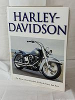 Front cover showing title and motorcycle image