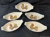 Five Otagiri rooster stoneware dishes displayed