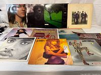 Overall view of all LPs laid out showing sleeve fronts