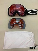 Goggles, spare lens, and pouch overview
