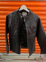 Jacket on hanger showing overall front view