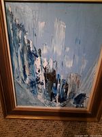 Front view of framed abstract painting showing composition and frame