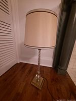 Full view of lamp with shade showing height and style
