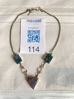 Full view of choker with two rectangular stones and triangular pendant