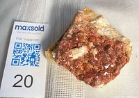 Overall view of citrine crystal cluster with scale tag