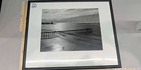 Front view of framed Ansel Adams Fiat Lux print with ruler for scale