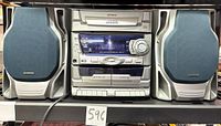 Full view of Audiovox CD2772 stereo with both speakers