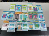 Full layout of all embossing folders on counter