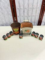 All nine pieces: owl bucket, pumpkin planter, seven turkey figurines