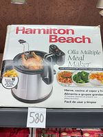 Front of boxed Hamilton Beach Meal Maker multi-cooker showing product image and branding