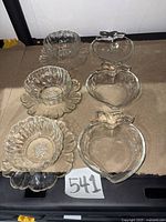 Group of three apple-shaped and three peony dishes