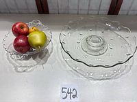 Overall view of cake stand, compote bowl and faux fruit