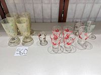 Entire group of 12 glasses arranged on table