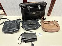 Group shot of all five handbags