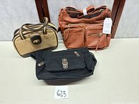 Group shot of three handbags