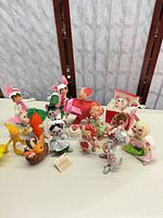 Full group of figurines displayed together on table