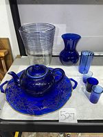 Full set showing teapot on tray, vases, tumblers and shot glasses