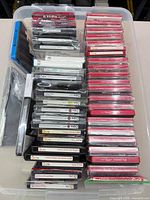 Transparent tote holding rows of Sizzix dies