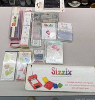 Entire lot showing machine box, dies, pads, converter