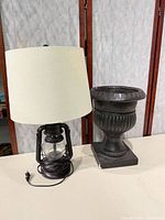 Lamp and planter side by side showing overall condition