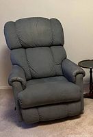 Front angled view of recliner in upright position