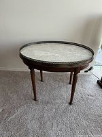 Full view of walnut bouillotte table