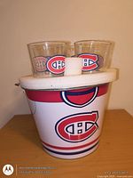 Front view of NHL Montreal Canadiens ice bucket with two logo tumblers visible