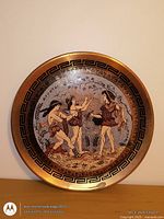 Front of copper plate showing Greek scene and border