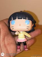 Front view of Funko Pop Himawari Uzumaki figure showing facial details and outfit