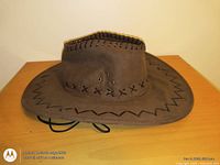 Front and side view of brown faux leather cowboy hat showing crown stitching, vent eyelets, brim detail, chin strap