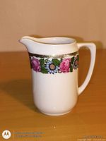 Front and side view showing floral band and overall form