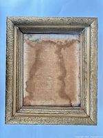 Full view of rectangular gilt frame front