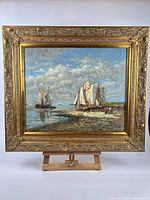 Full view of framed oil painting on easel