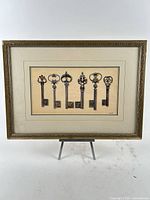 Full view of framed print showing keys and frame