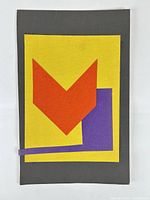 Full view of abstract collage showing red chevron, purple rectangle on yellow and grey board