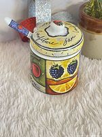 overall view of jam jar with spoon and lid