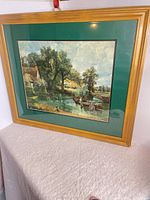 Front view of framed print showing image, mat and frame